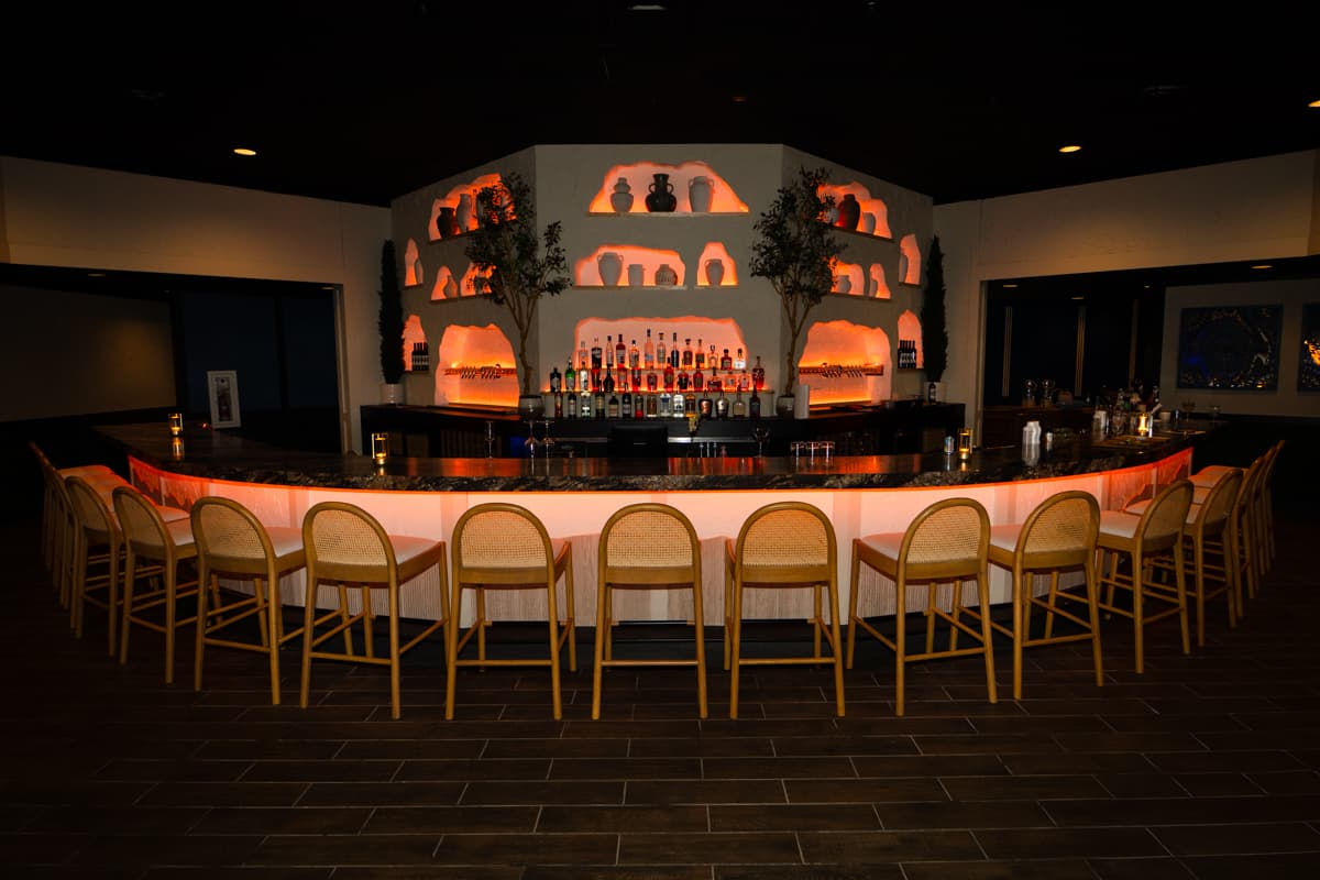 Putt Street Social venue interior — glowing ambiance, mini golf, cocktails